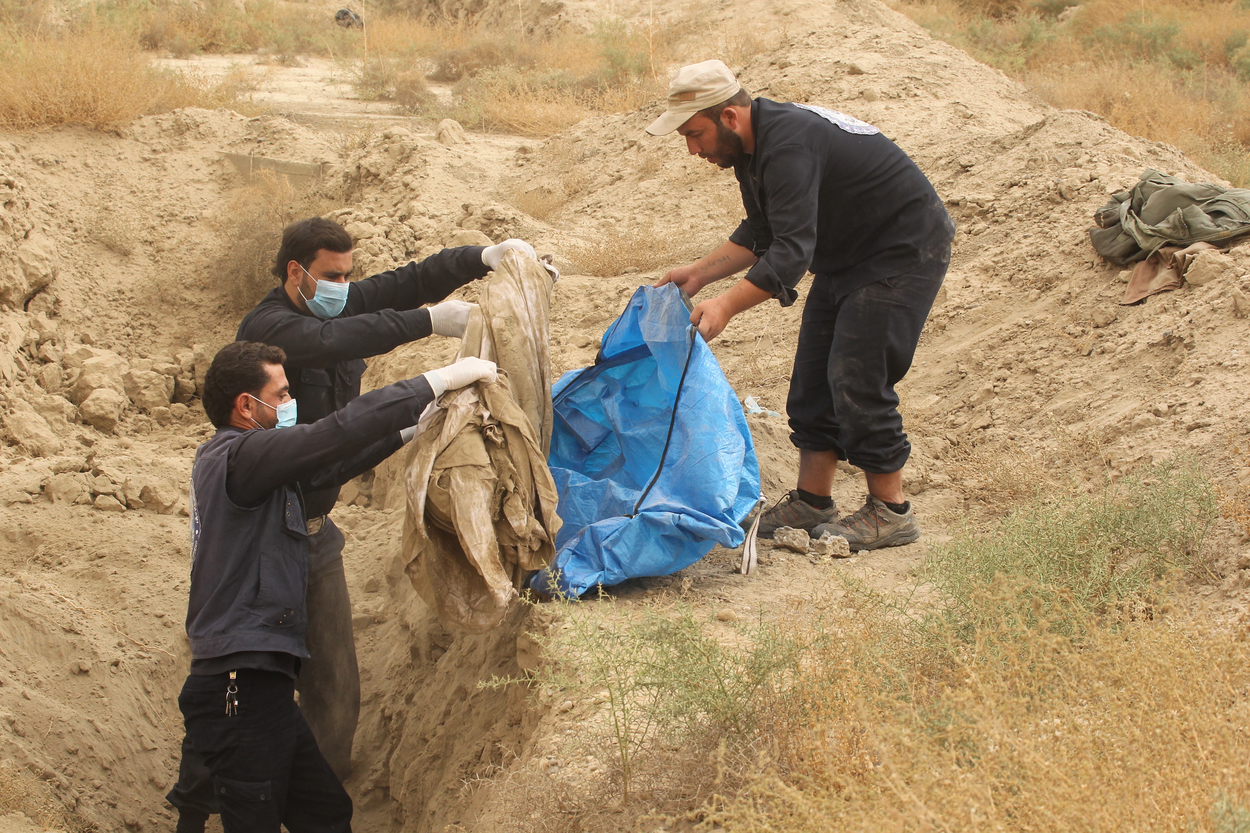 First responders discover mass graves